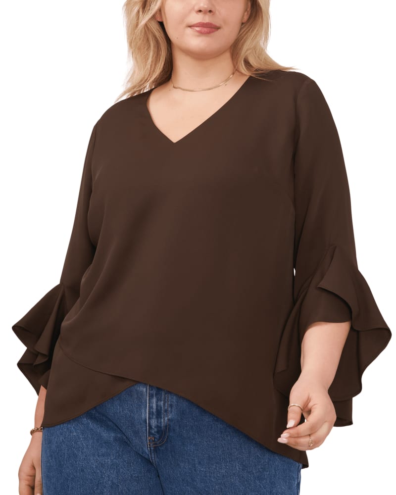 Front of a model wearing a size 1X Natalie Flutter Sleeve Tunic in FRENCH ROAST by Vince Camuto. | dia_product_style_image_id:261378